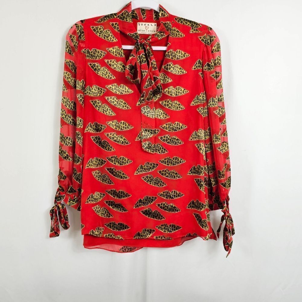 Alice + Olivia X Donald Robertson Sheila Lips Burnout Tie Neck Top